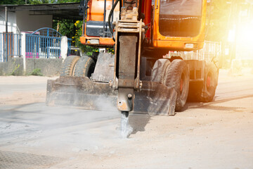 Large excavators drilling roads in road construction work