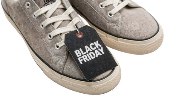 Casual sneakers with black friday sale tag highlighting exclusive discounts