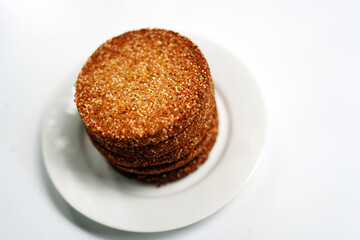 White Plate with Homemade Cookies or Biscuits on Minimal White Background