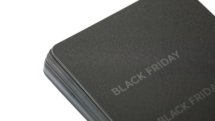 Black friday sale concept: stack of black cards with subtle branding for promotions