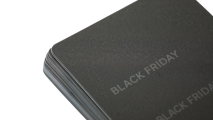 Black friday sale concept: stack of black cards with subtle branding for promotions