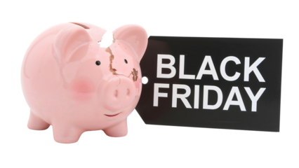 Cracked piggy bank with black friday tag highlighting holiday shopping impact
