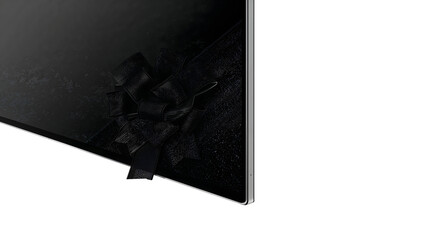 Elegant black ribbon gift wrap on modern ultraflat screen device edge for stylish presentations
