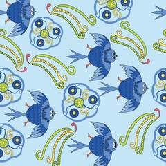 Seamless ethnic pattern with birds and decorative ornaments