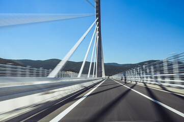 Obraz premium Speeding across Pelješac Bridge Croatia scenic cable stayed highway fast driving
