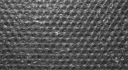 Closeup of clear plastic bubble wrap with raised circles