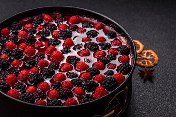 Pie, cheesecake with raspberries and blackberries, mascarpone cheese. Piece of cheesecake