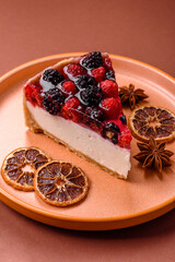 Pie, cheesecake with raspberries and blackberries, mascarpone cheese. Piece of cheesecake