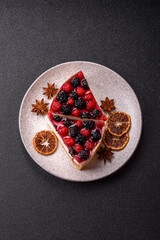 Pie, cheesecake with raspberries and blackberries, mascarpone cheese. Piece of cheesecake