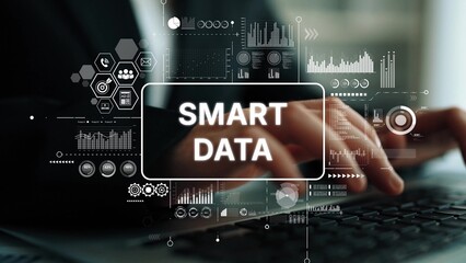 Businessman Using Laptop with Smart Data Concept and Digital Analytics Graphics Overlay. Asymptotic...
