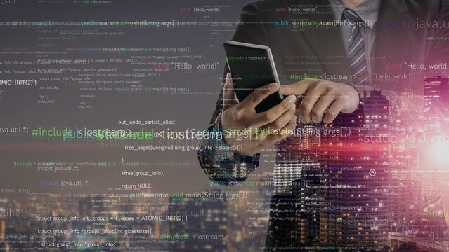 A businessman holds a smartphone in a vibrant city at night, overlaid with computer code, symbolizing the blend of technology and modern communication in urban environments. Xenic - Powered by Adobe