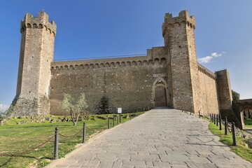 North-facing stretch of walls and gate of the local Fortezza (fortress) built on the city's highest...
