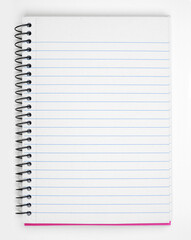 Open coil notebook with blank lined paper page over a white background. Copy space.