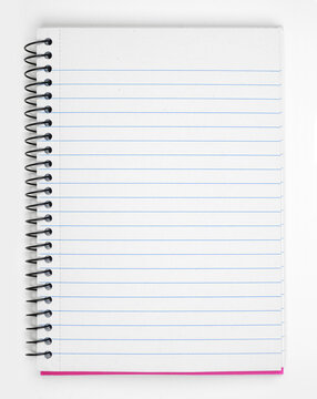 Open coil notebook with blank lined paper page over a white background. Copy space.