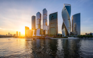 Sunset view of skyscrapers of Moscow City business center and Moscow river in Moscow, Russia.