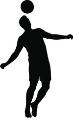 Silhouette of a soccer player heading the ball
