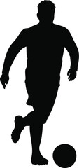 Silhouette of a soccer player dribbling the ball
