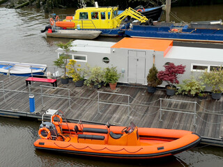Jetty and boats on the River Clyde in Glasgow