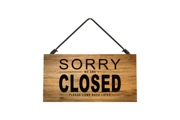 A closed sign posted on glass door of store. Concept of shop service business closed on holidays.
