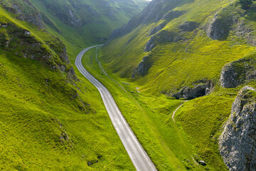Winnats Pass road in mountain gorge in Peak District, England