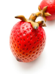 a juicy quandong, white background, red skin, tart flavor, 4k resolution