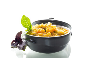 Fresh herbs on top of warm pea mash