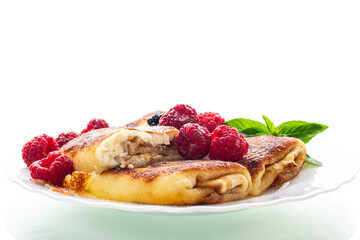 Traditional European breakfast pancakes with fresh berries