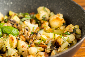 Homemade fried cauliflower with greens