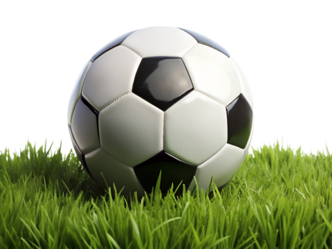 A classic black and white soccer ball sits on lush green grass isolated on transparent background