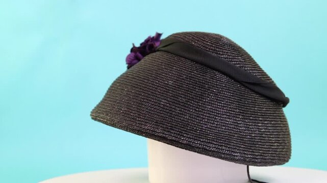 Vintage black straw hat with a artificial flowers