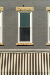 A window on a commercial building in a small town