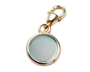 A small gold charm with a round blue stone and a secure gold clasp isolated on transparent background
