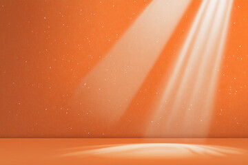 Orange studio background with bright light beams and small white particles orange background spotlight