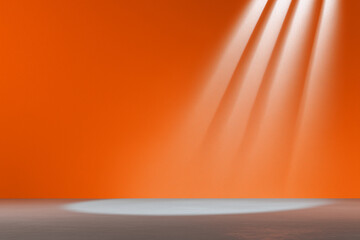 Bright orange wall with concrete floor and angled spotlight beams background