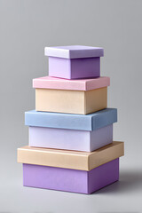 Stack of pastel gift boxes in a tall column. Perfect for festive branding, celebration promotions, or packaging visuals.