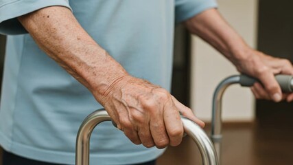 Elderly man using walker for support, symbolizing mobility and independence - Powered by Adobe