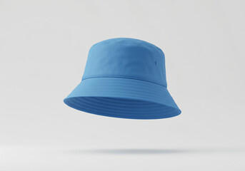Fototapeta premium A floating blank blue bucket hat on a solid white background 