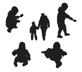Set of childrens silhouettes walking outdoors and engaged in various games. Vector illustration.