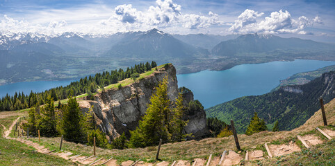 Panoramic view of Bernese Alps and Lake Thun in the Swiss canton of Bern from the summit of...