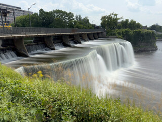 A waterfall falling into a river