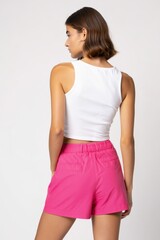 Woman in White Tank Top and Pink Shorts - Back View