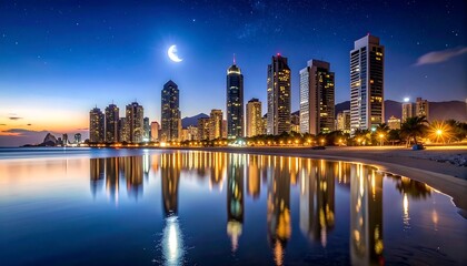 Obraz premium City skyline reflected on tranquil water at night