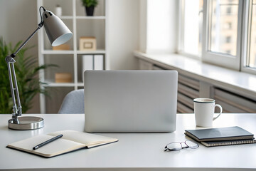 Fototapeta premium Clean Minimalist Workspace with Laptop, Notebooks & Natural Light