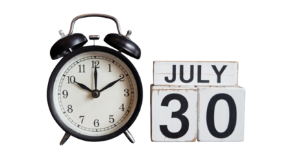 Vintage alarm clock and wooden blocks showing July 30th, perfect for time management themes.