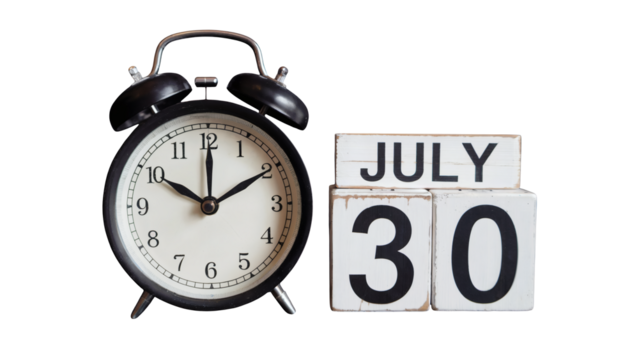 Vintage alarm clock and wooden blocks showing July 30th, perfect for time management themes.