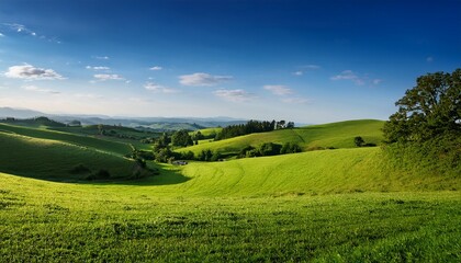Fototapeta premium a vibrant serene landscape showcasing rolling hills lush greenery and a clear blue sky evoking tranquility and nature s beauty