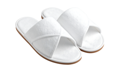 Pair of white hotel slippers isolated on transparent background