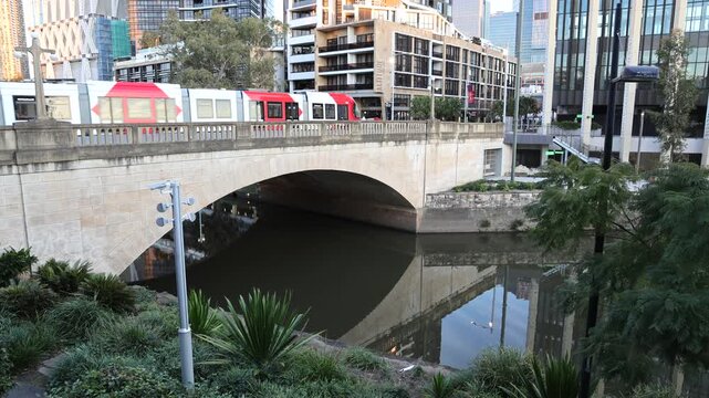 Parramatta city CBD Church Street Lennox bridge tram at sunset in Sydney.
