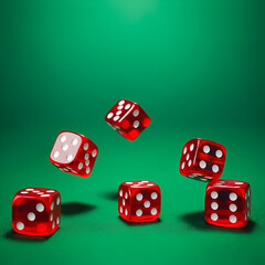 Photo of several red dice falling on green table on background of multicolored spots