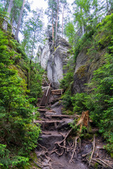 Adrspach, Czech Republic - 20.07.2025: View of the Adrspach-Teplice Rocks with Lake Piskovna. Forest and rocks.